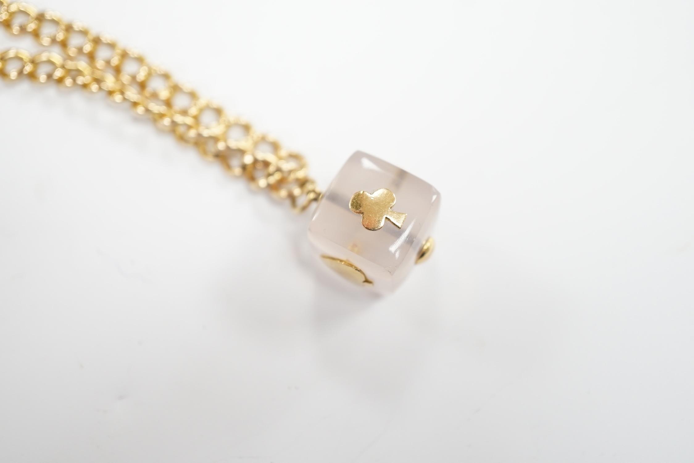 An Edwardian 15ct gold curb link bracelet, 16cm, hung with a later mounted glass cube charm, gross weight 20.8 grams.